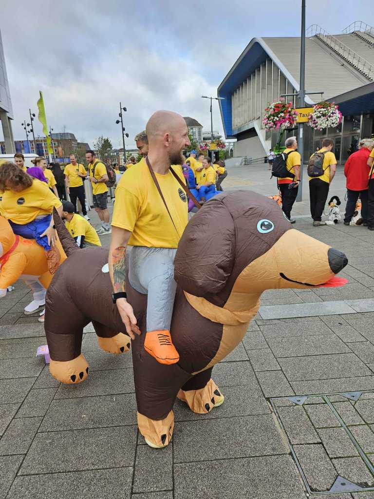 a man in an inflatable dog costume